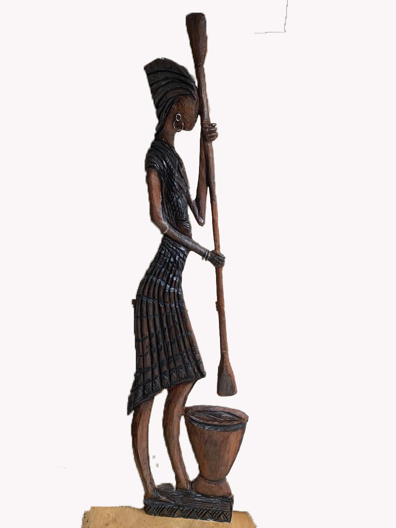 A Symbol Of Strength Of A Woman Pounding Yam